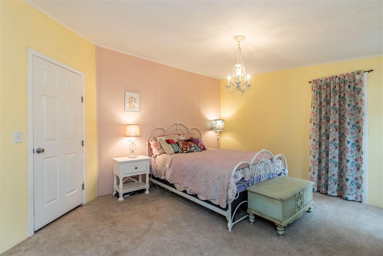 8409 Creek Road Willow Spring, NC 27592 - Photo 18 of 27 Master Bedroom