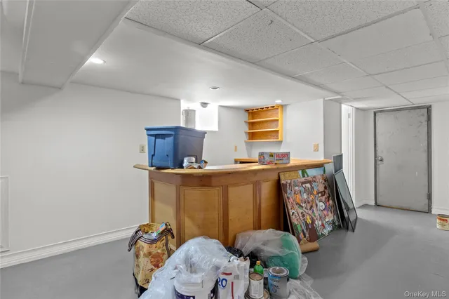 a bedroom with bed and a window