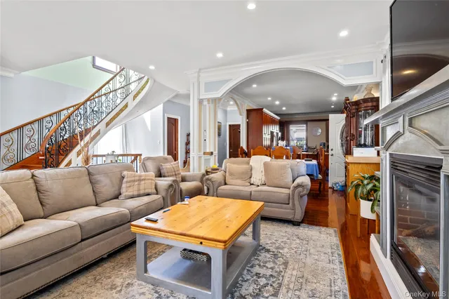 a living room with furniture and a rug