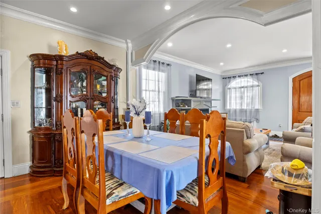 a view of a living room and dining room