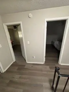 a view of a hallway view with staircase