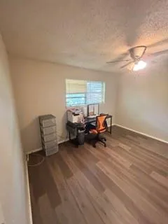 a living room with furniture and window