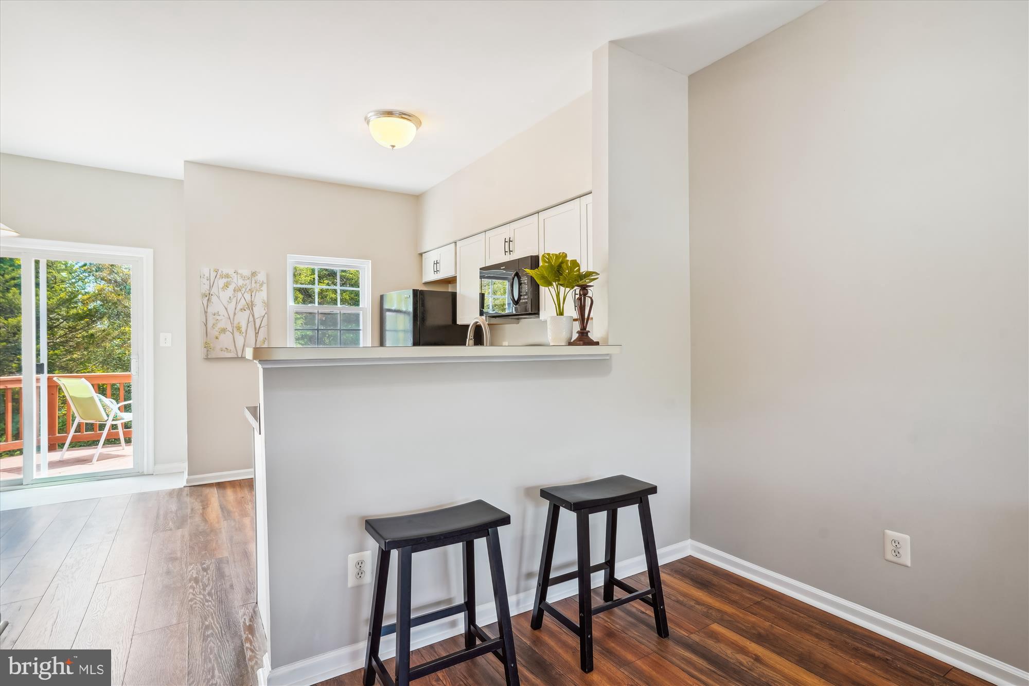 4158 Ashmere Circle Dumfries, VA 22025 - Photo 6 of 28 a view of a dining room with furniture and wooden floor