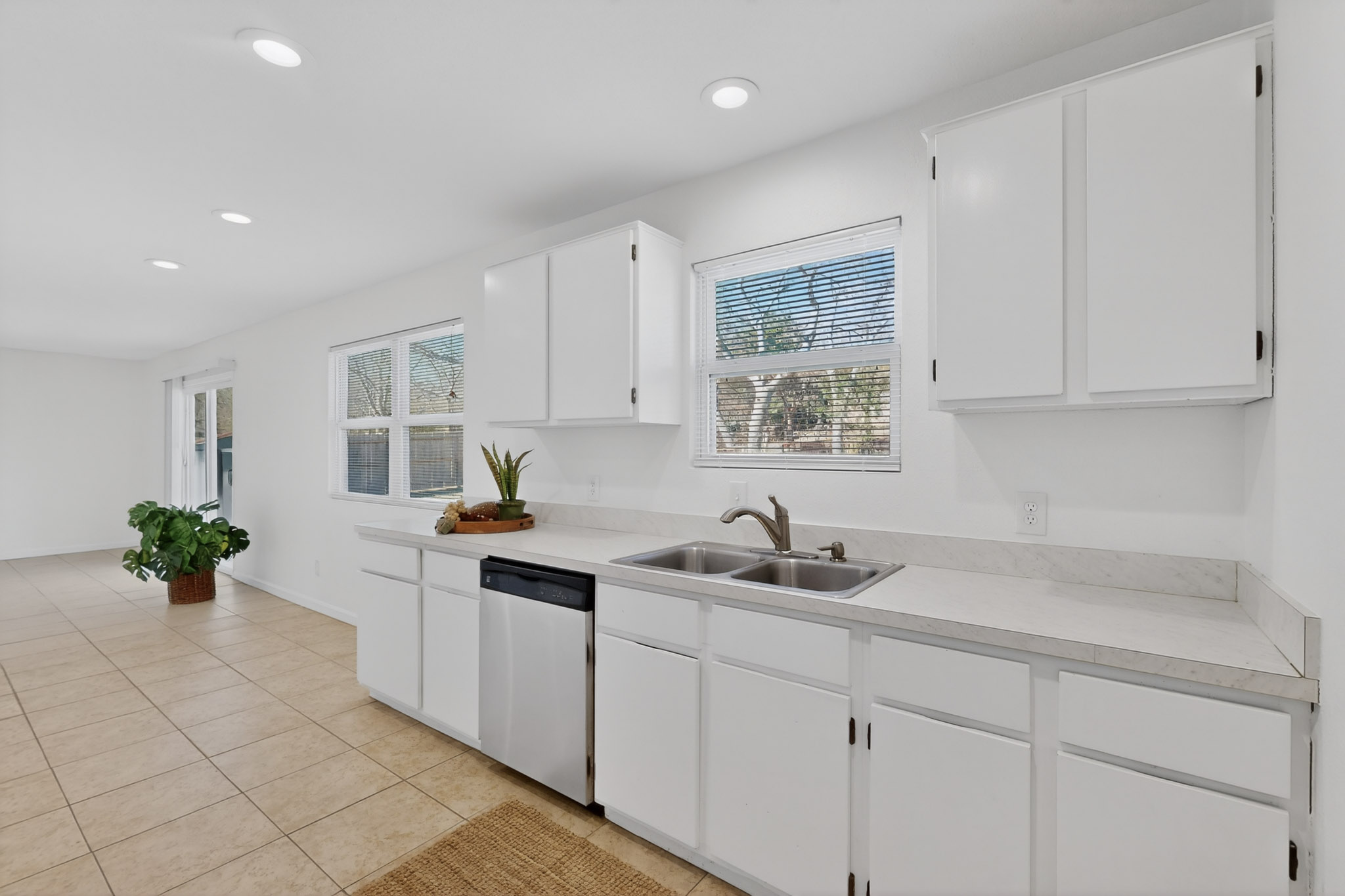 7200 Barnsdale Way Austin, TX 78745 - Photo 12 of 26 a kitchen with a sink and cabinets