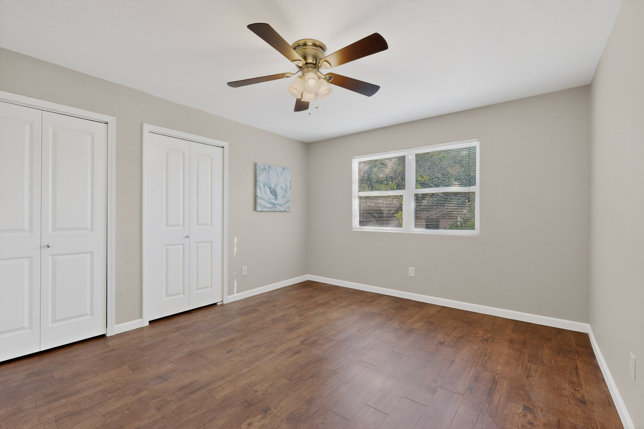 7200 Barnsdale Way Austin, TX 78745 - Photo 13 of 26 an empty room with window and wooden floor