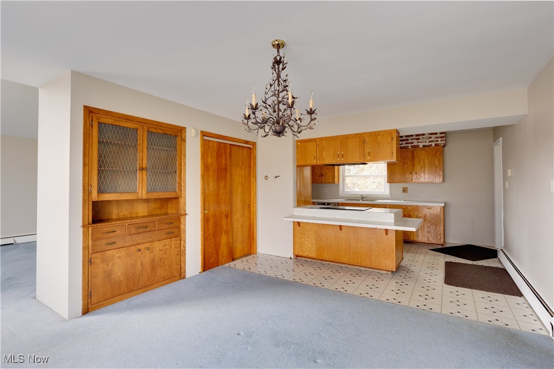 1847 Conley Road Mogadore, OH 44260 - Photo 14 of 42 Dining room with built in and open to kitchen