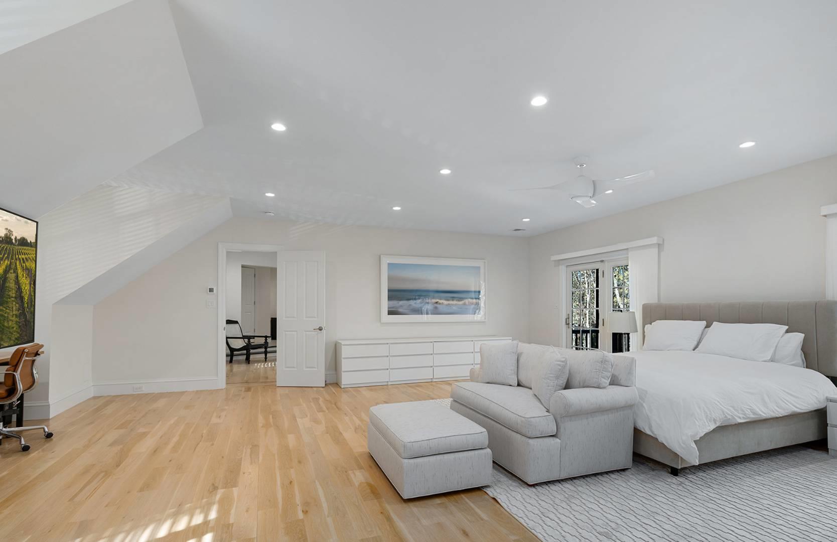 421 Edge Of Woods Road Southampton, NY 11968 - Photo 14 of 33 Bedroom with light wood-style flooring and recessed lighting