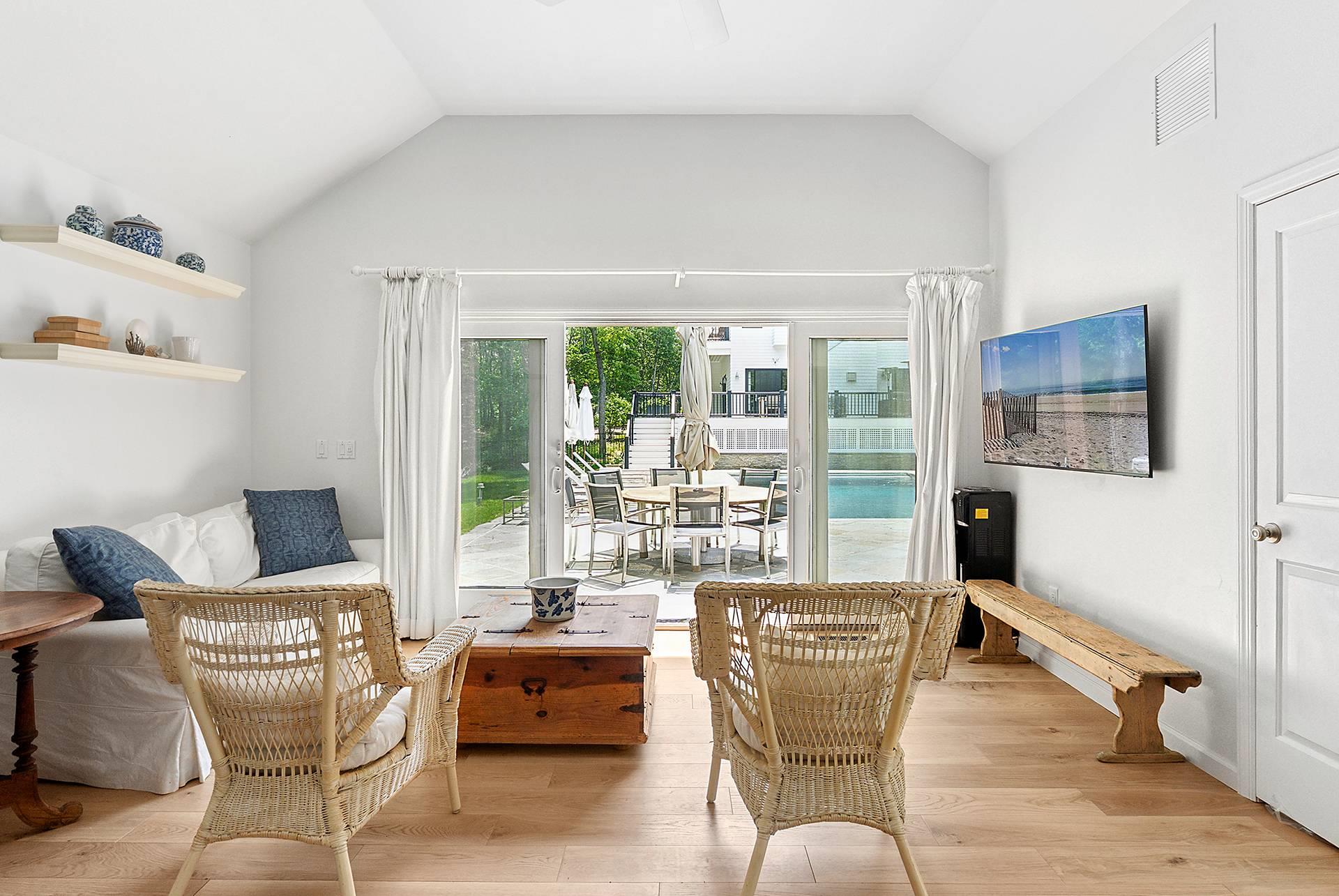 421 Edge Of Woods Road Southampton, NY 11968 - Photo 27 of 33 Sitting room featuring lofted ceiling and light wood-type flooring