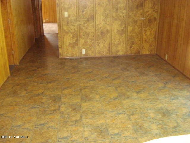 710 South Hennessy Road Yakima, WA 98908 - Photo 8 of 15 a view of entryway with wooden wall