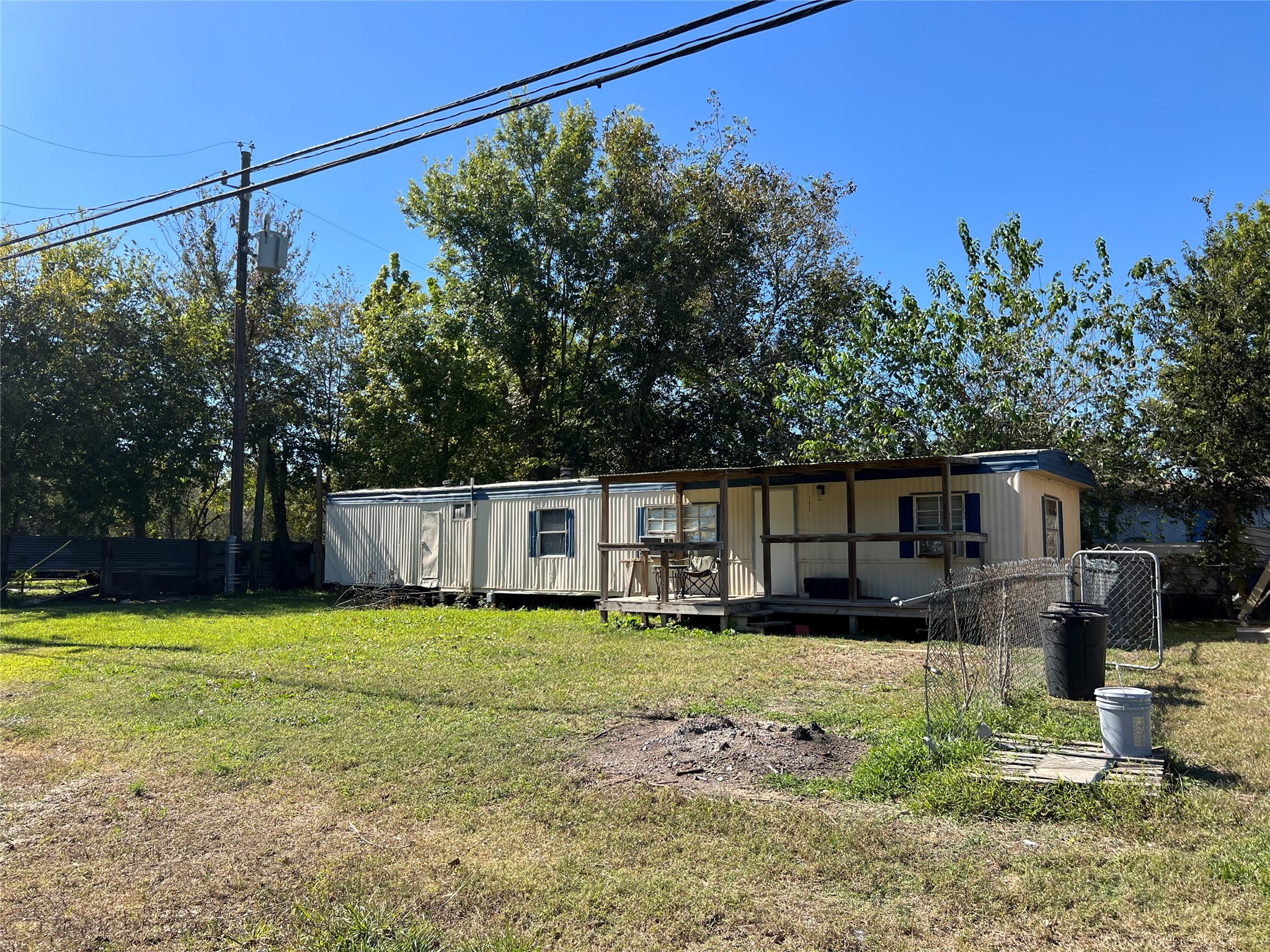 13935 Smith Road, Unit 101 Humble, TX 77396 - Photo 13 of 14 a view of a house with backyard and sitting area