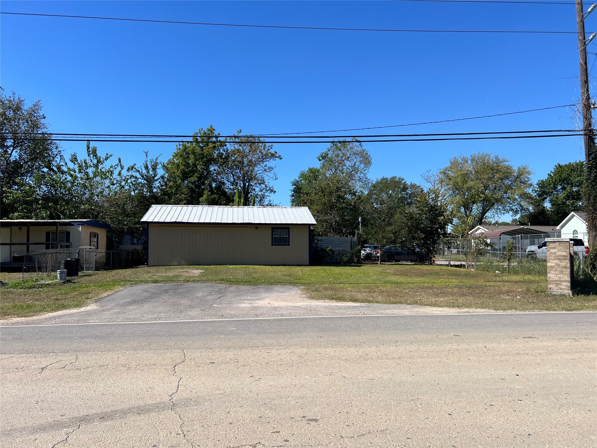13935 Smith Road, Unit 101 Humble, TX 77396 - Photo 2 of 14 20X30 Metal Building renovated to be a Efficiency apartment with new appliances and AC&Heating. This building can also be an office.