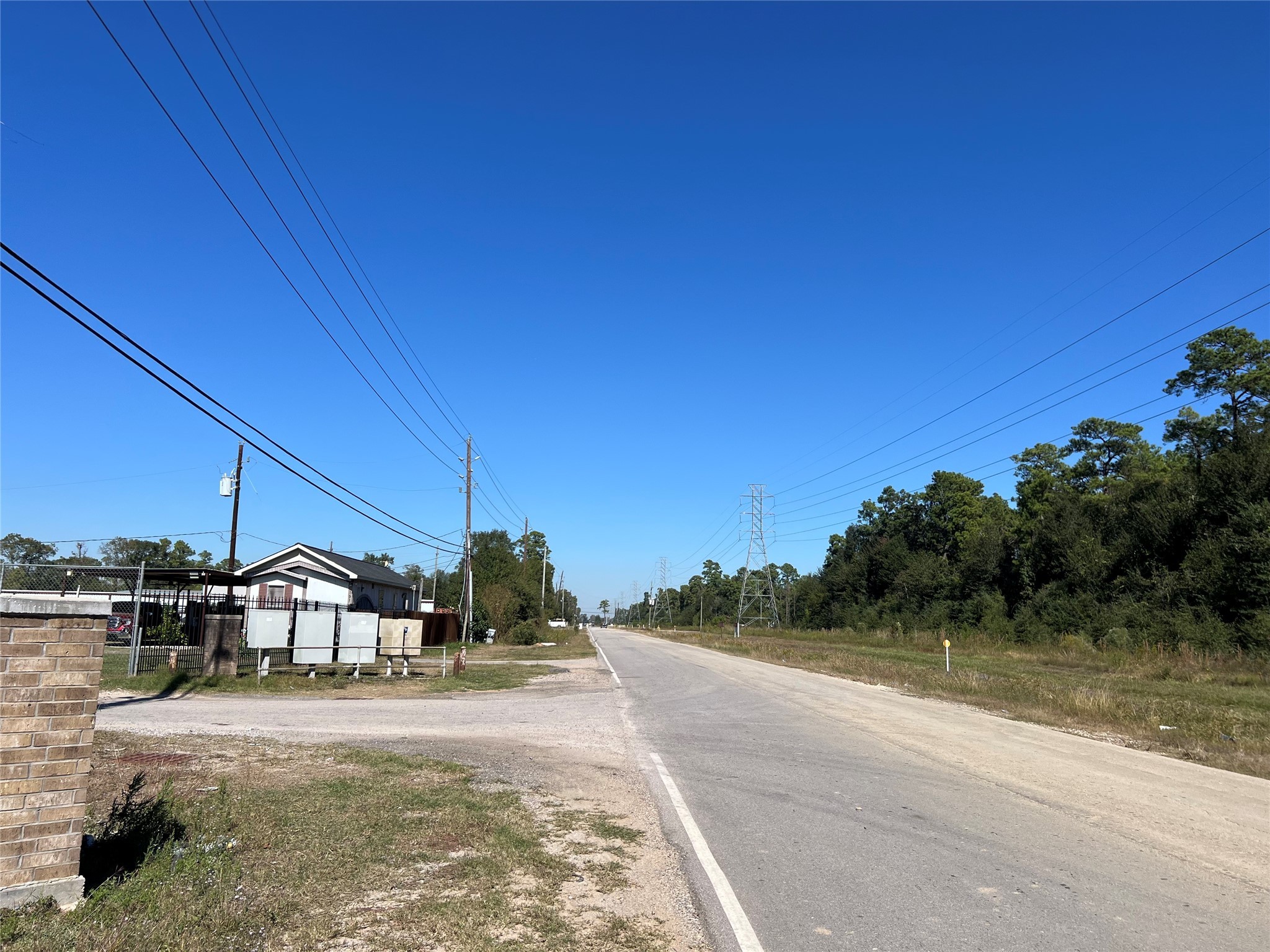13935 Smith Road, Unit 101 Humble, TX 77396 - Photo 4 of 14 a view of a house with a yard