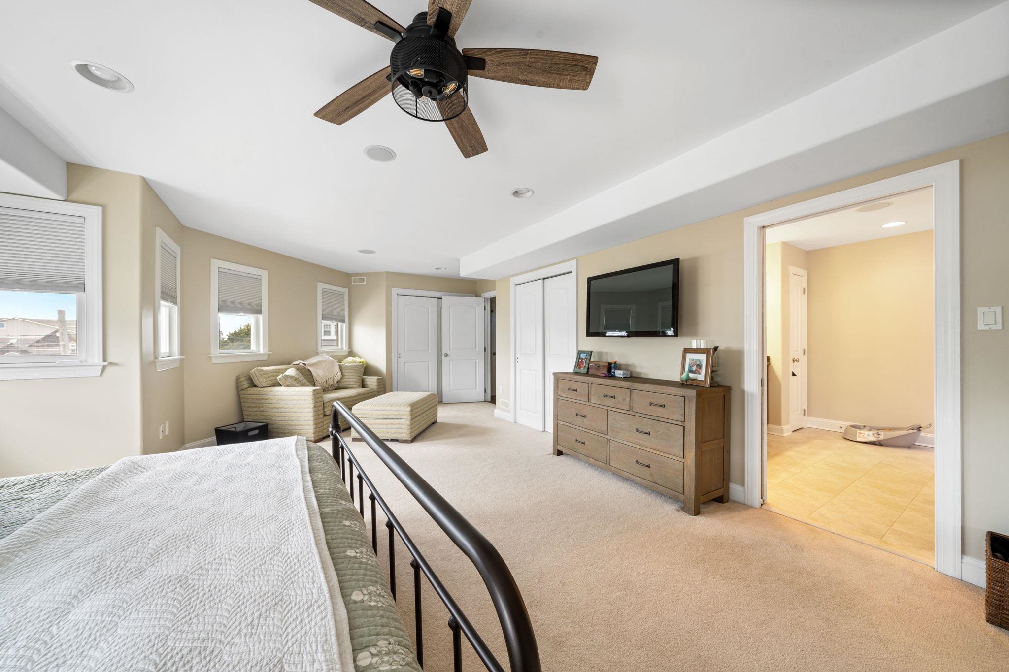 147 43rd Street Sea Isle City, NJ 08243 - Photo 26 of 50 a large white kitchen with sink stove and refrigerator