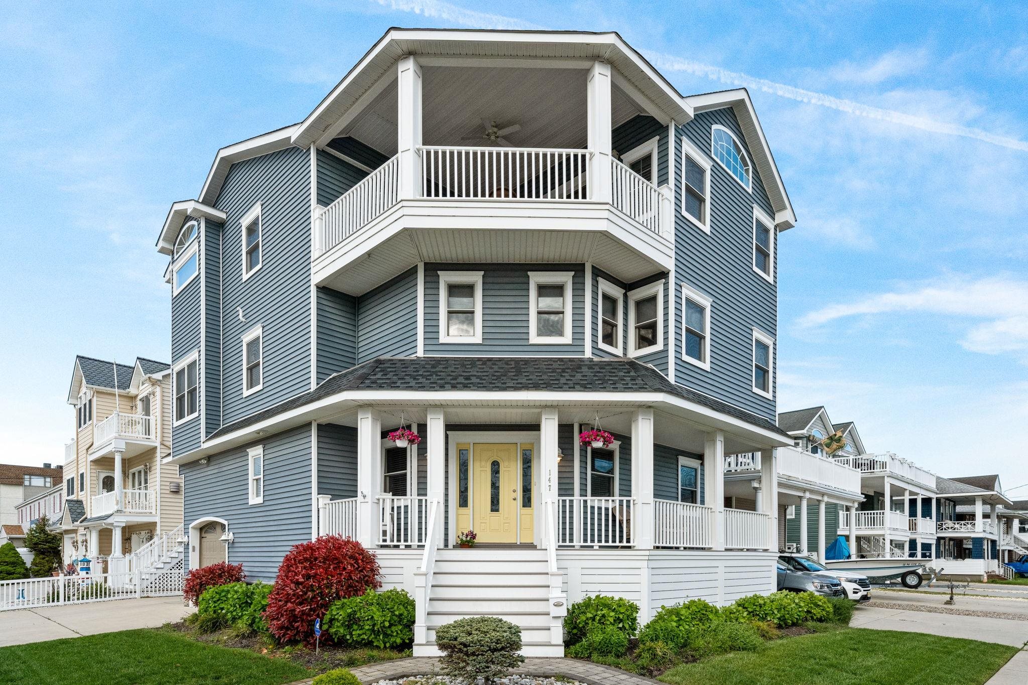 147 43rd Street Sea Isle City, NJ 08243 - Photo 31 of 50 a front view of a house with garden