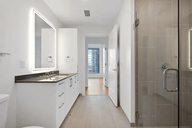 a view of a hallway with washer and dryer