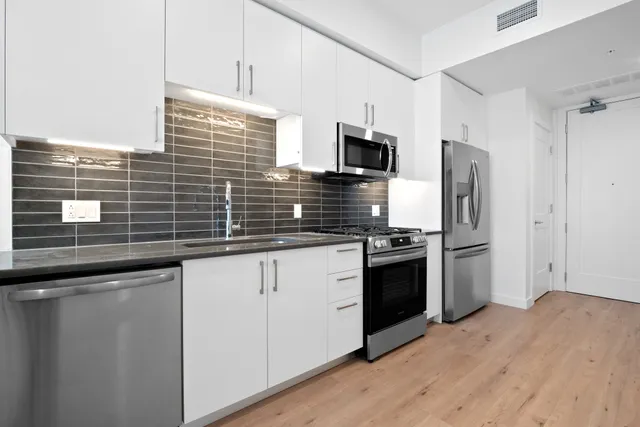 a view of a living room with a sink