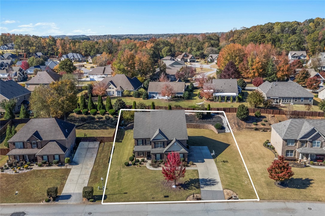 1005 Winmar Drive Anderson, SC 29621 - Photo 45 of 50 This elevated view captures a classic home with lush surroundings, offering a serene neighborhood setting.