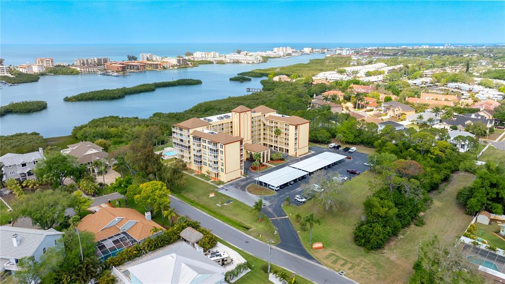 9000 Commodore Drive, Unit 604 Seminole, FL 33776 - Photo 35 of 50 a view of a city with an ocean view