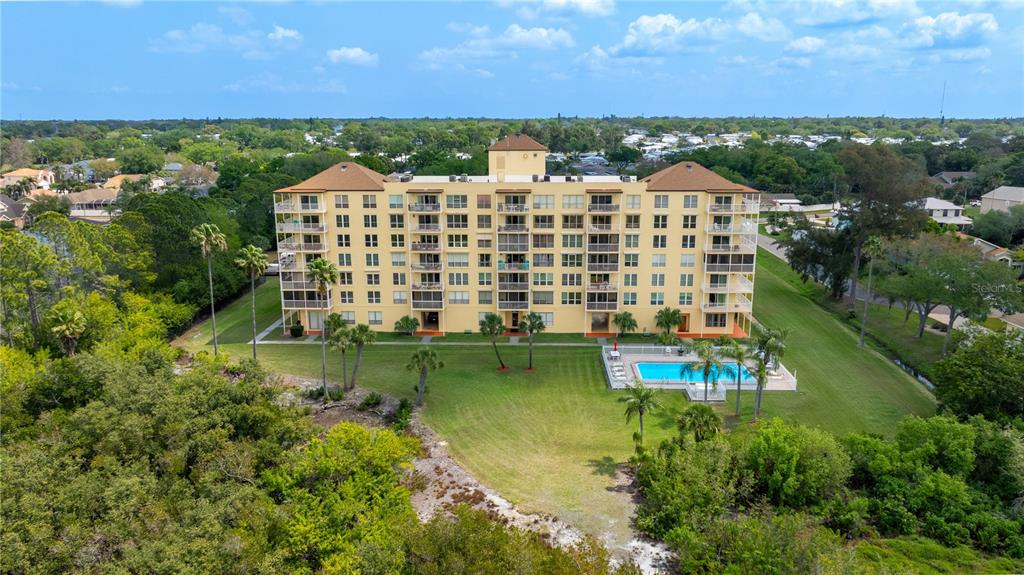 9000 Commodore Drive, Unit 604 Seminole, FL 33776 - Photo 38 of 50 a view of large building
