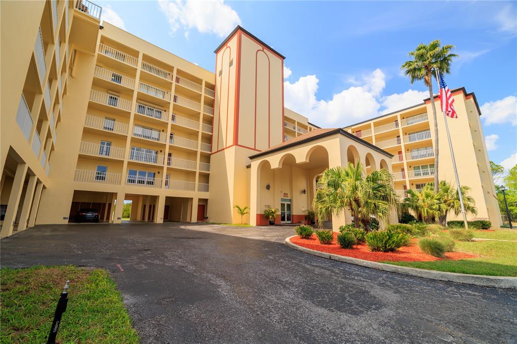 9000 Commodore Drive, Unit 604 Seminole, FL 33776 - Photo 44 of 50 a view of street with large building