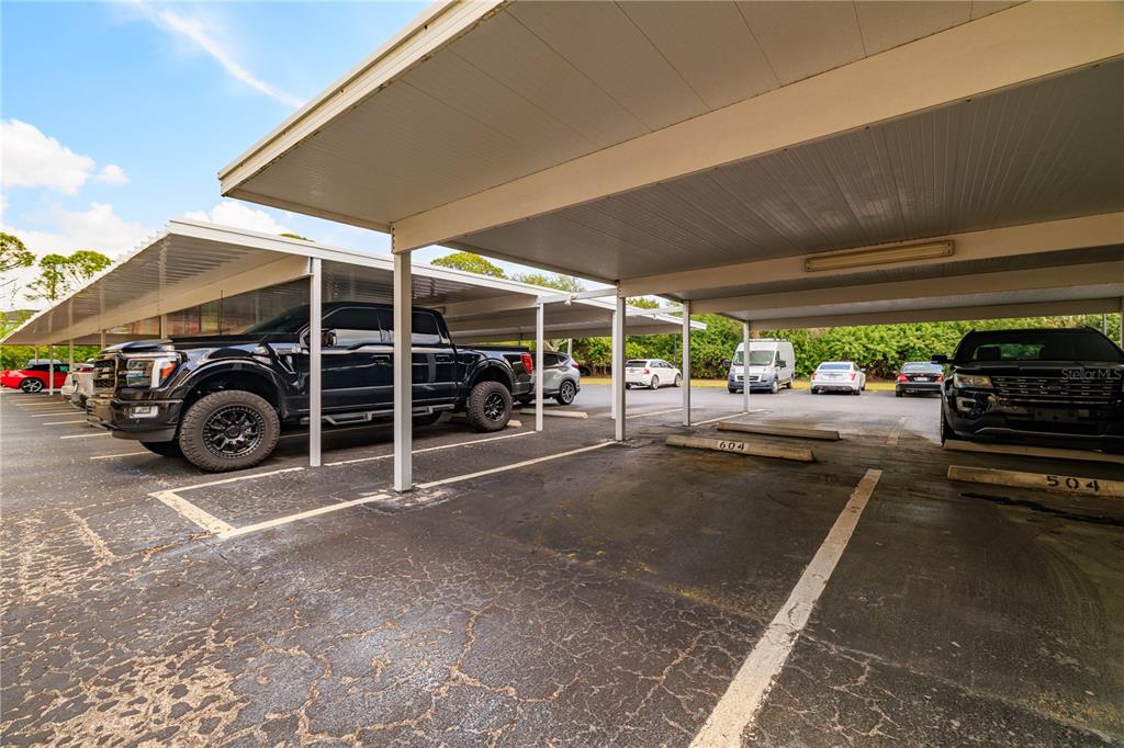 9000 Commodore Drive, Unit 604 Seminole, FL 33776 - Photo 45 of 50 a view of a car garage