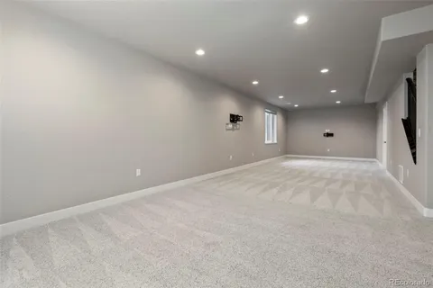a view of empty room with windows