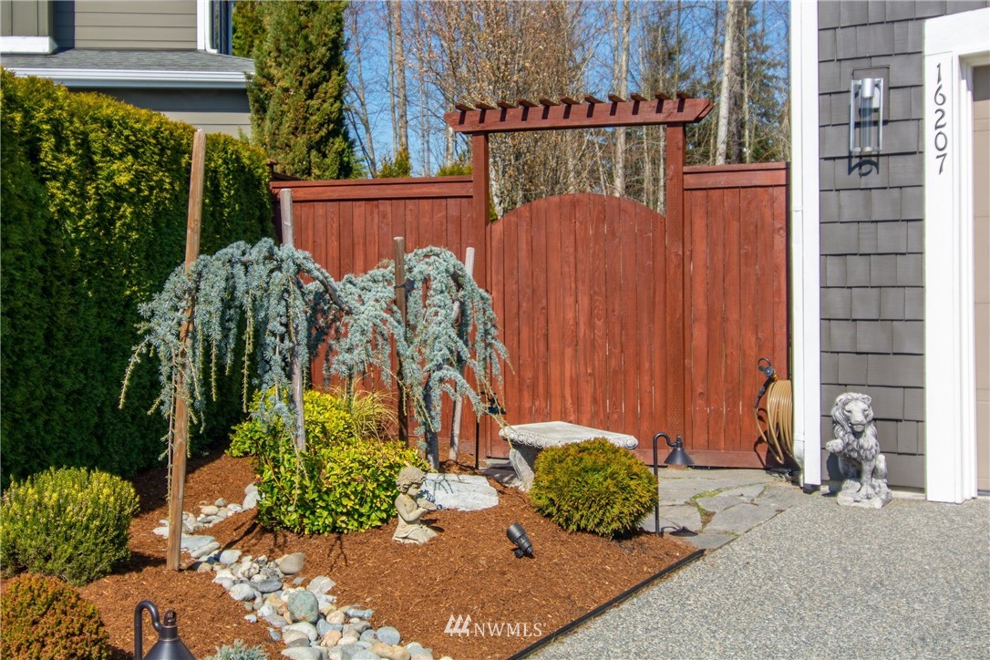 16207 40th Avenue Southeast Bothell, WA 98012 - Photo 22 of 30 a view of a back yard of the house