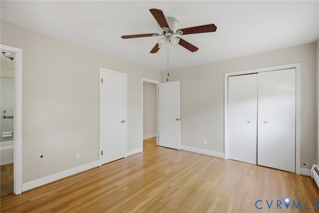 8210 Ireton Road Henrico, VA 23228 - Photo 15 of 36 a view of room with wooden floor and ceiling fan
