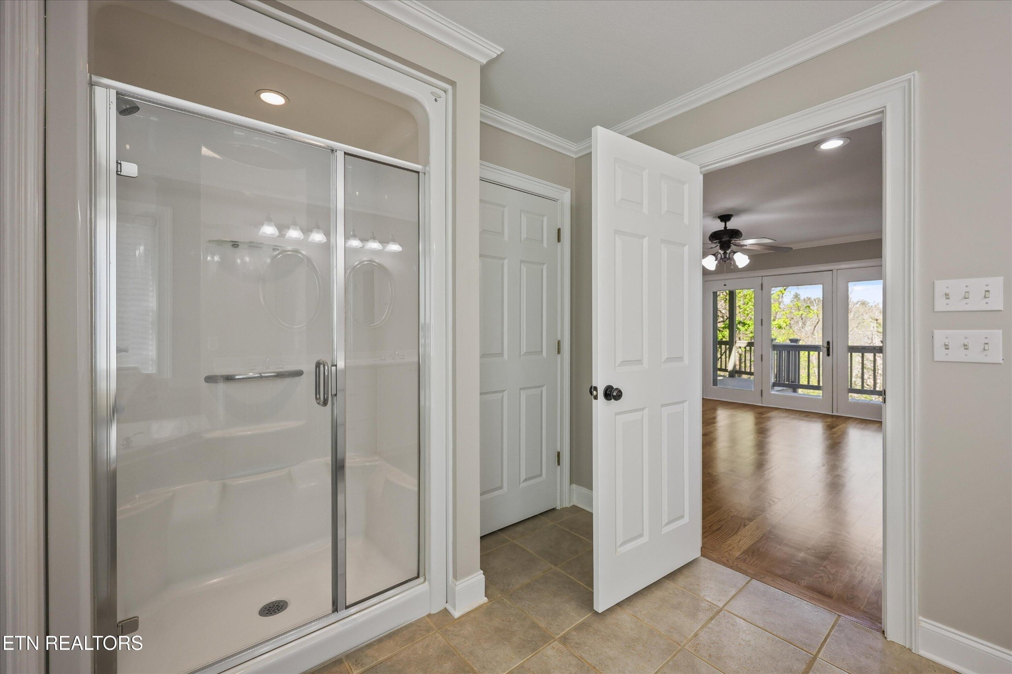 865 Stonegate Way Townsend, TN 37882 - Photo 17 of 60 a bathroom with a glass shower door and a bath tub