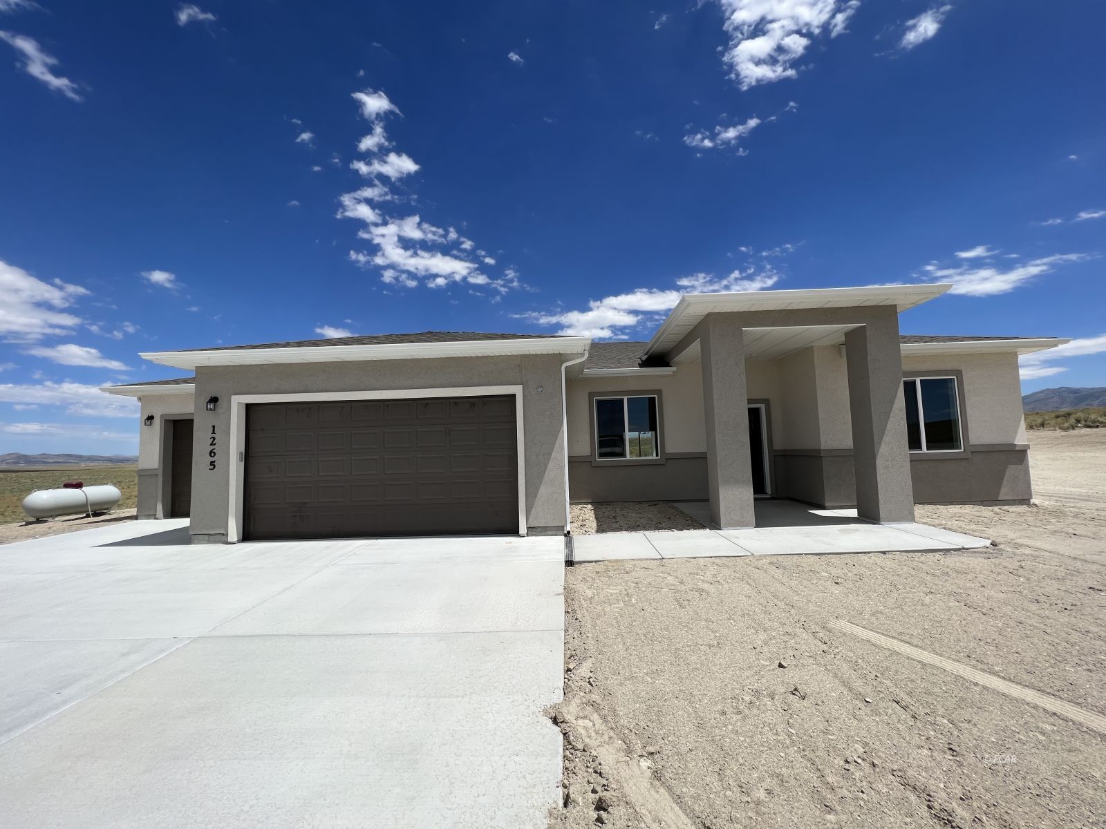 1265 Sun Vly Road Spring Creek, NV 89815 - Photo 29 of 34 a view of a house with a outdoor space