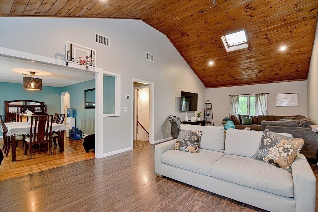 237 Kaufman Road Somerset, MA 02726 - Photo 4 of 38 a living room with furniture and wooden floor