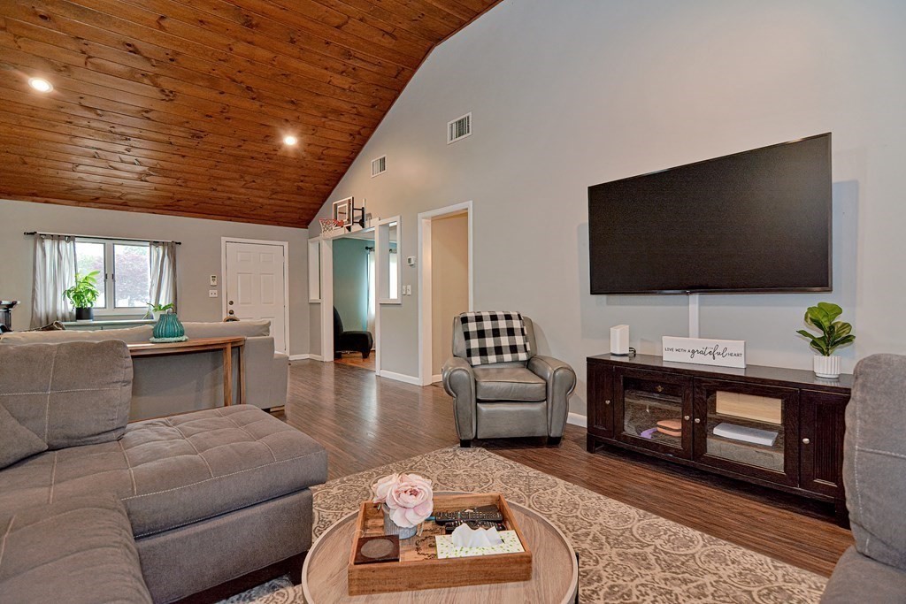 237 Kaufman Road Somerset, MA 02726 - Photo 5 of 38 a living room with furniture and a flat screen tv