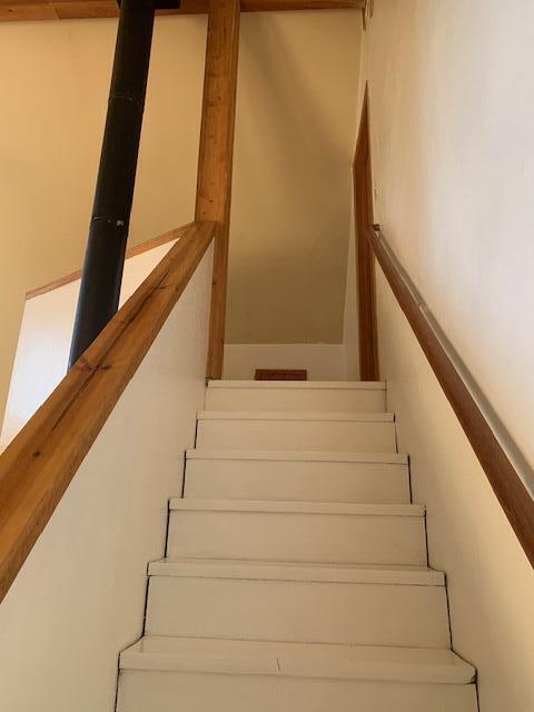 20394 Camas Road Burney, CA 96013 - Photo 36 of 56 a view of staircase with white walls and a window