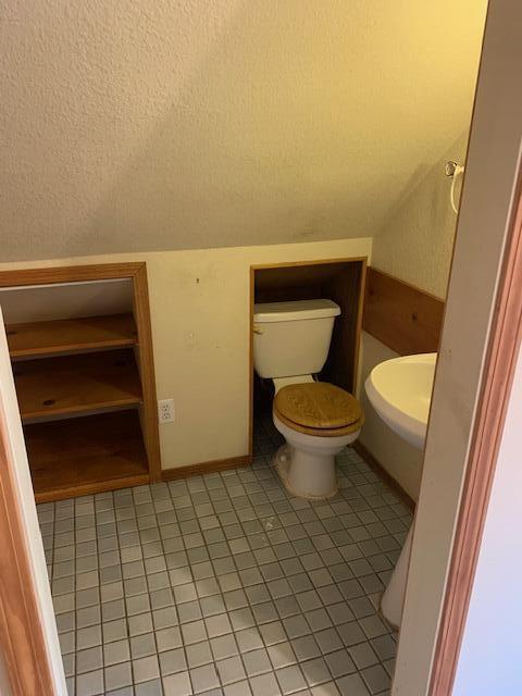20394 Camas Road Burney, CA 96013 - Photo 39 of 56 a bathroom with a toilet