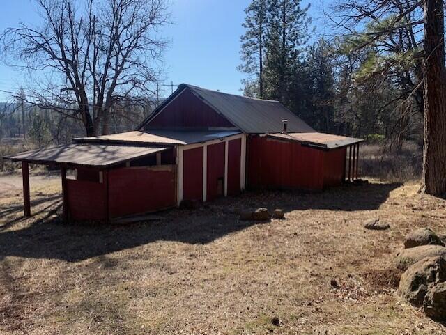 20394 Camas Road Burney, CA 96013 - Photo 48 of 56 a view of a house with a yard covered in snow