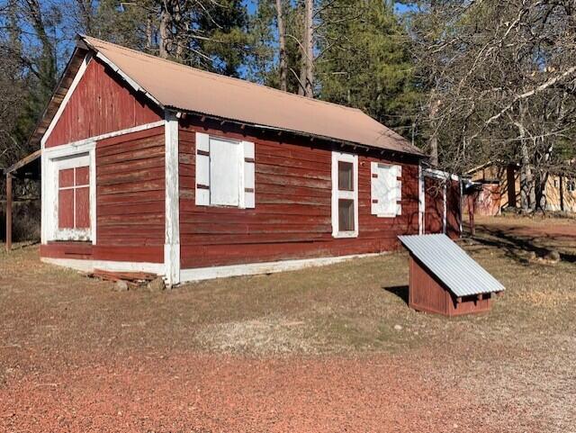 20394 Camas Road Burney, CA 96013 - Photo 49 of 56 a front view of a house with a yard