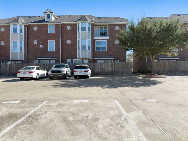 a car parked in front of a building