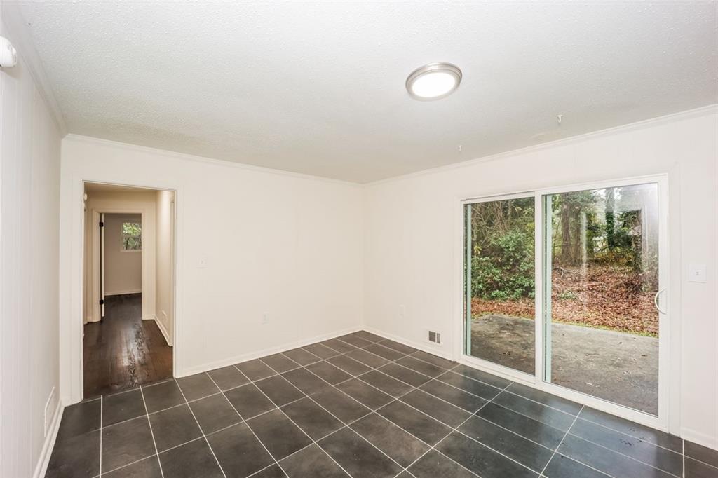 5726 Southwick Court Southwest Atlanta, GA 30349 - Photo 12 of 31 a view of an empty room