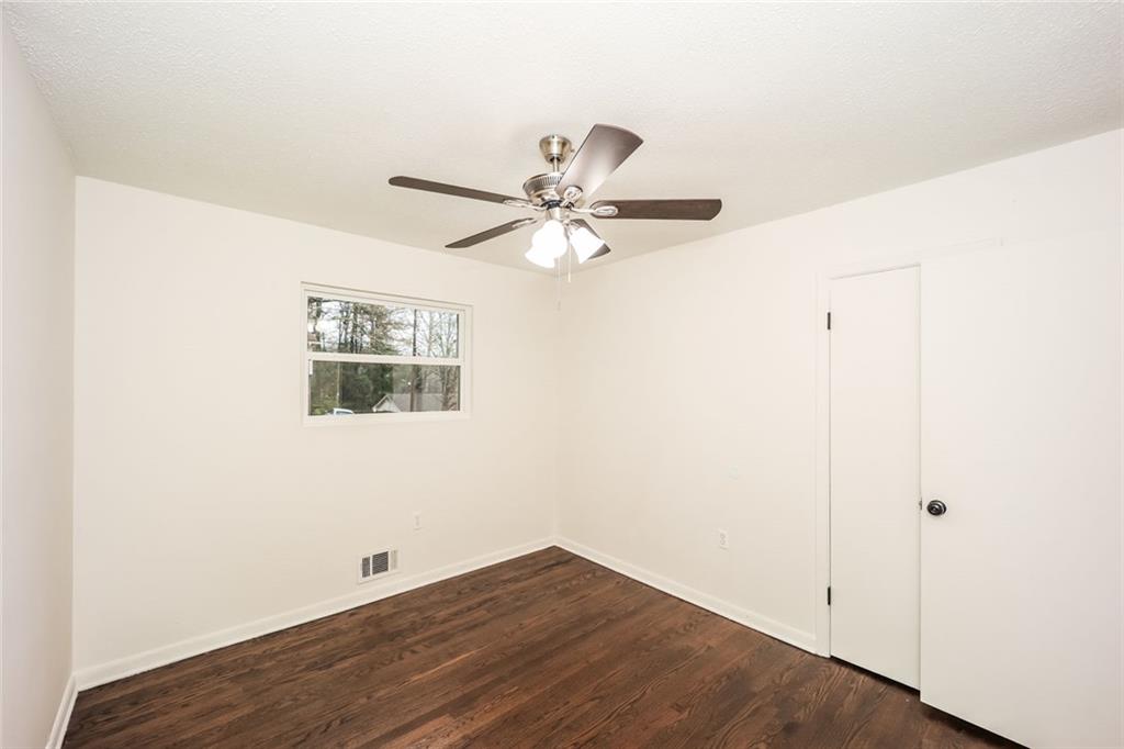 5726 Southwick Court Southwest Atlanta, GA 30349 - Photo 26 of 31 a view of an empty room with a window