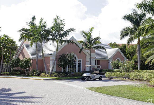 1000 Crystal Way, Unit C Delray Beach, FL 33444 - Photo 8 of 10 a view of house and outdoor space