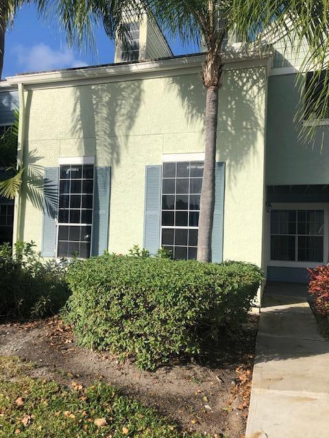 1000 Crystal Way, Unit C Delray Beach, FL 33444 - Photo 9 of 10 a view of a garden from a windows