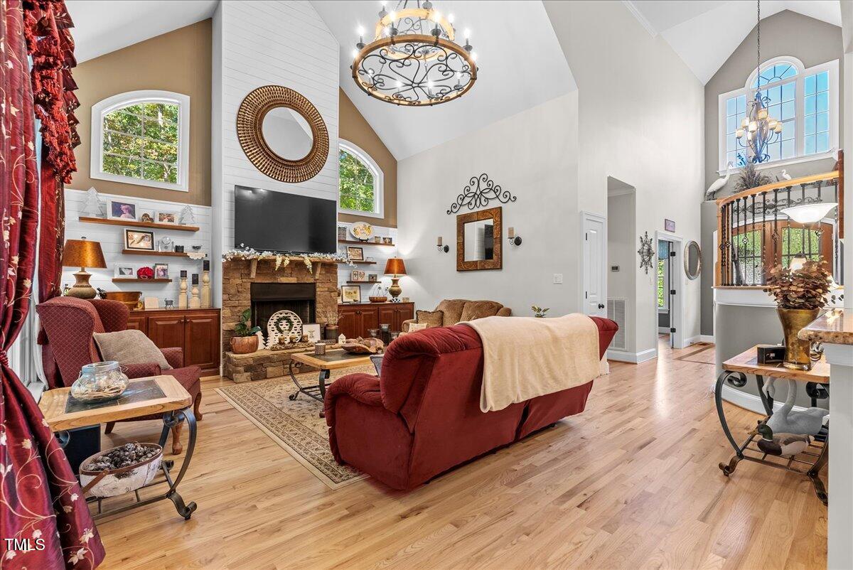105 Jackson Road Youngsville, NC 27596 - Photo 14 of 55 a living room with furniture and a fireplace