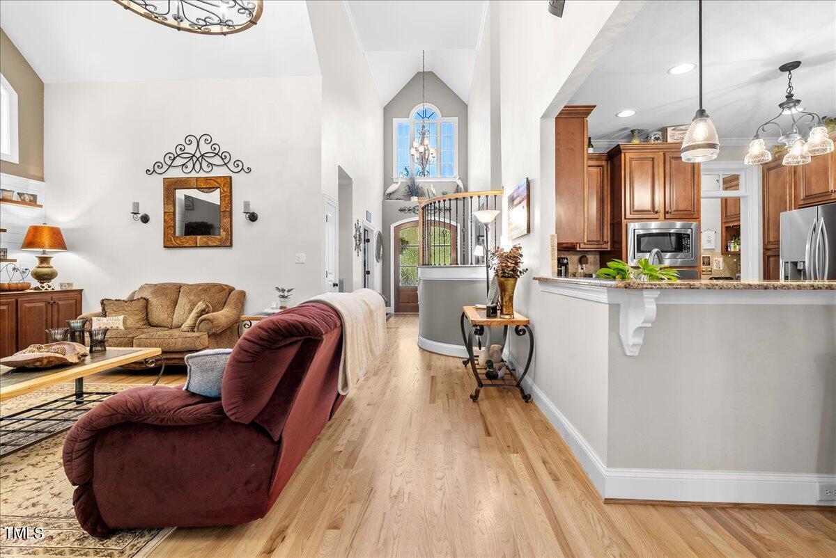105 Jackson Road Youngsville, NC 27596 - Photo 17 of 55 a living room with furniture and a fireplace