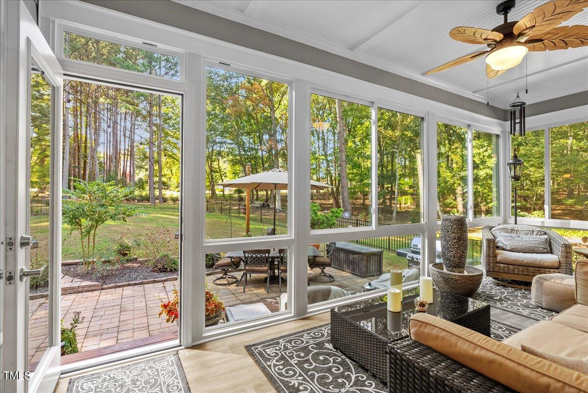 105 Jackson Road Youngsville, NC 27596 - Photo 20 of 55 a living room with furniture and a floor to ceiling window