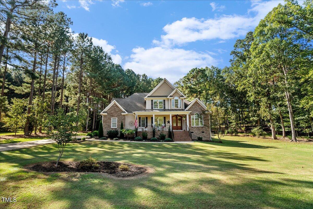 105 Jackson Road Youngsville, NC 27596 - Photo 2 of 55 a front view of a house with a yard