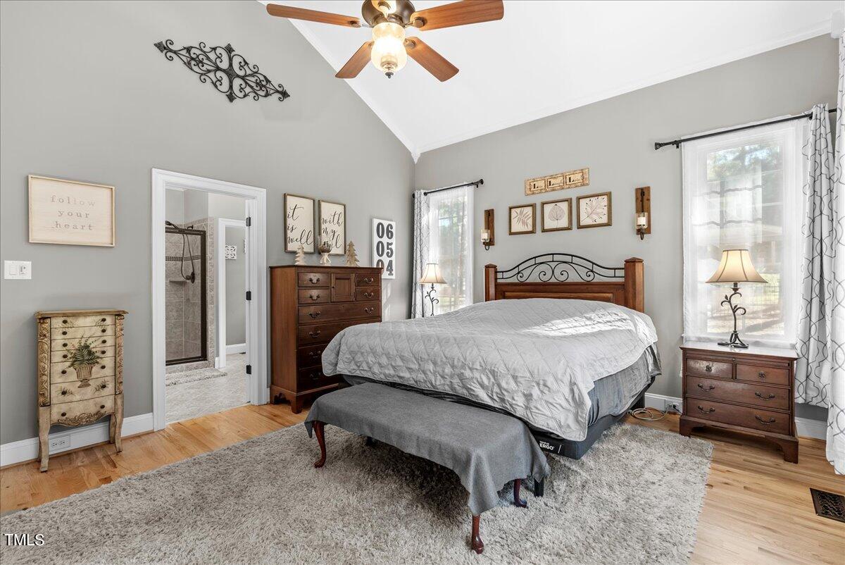 105 Jackson Road Youngsville, NC 27596 - Photo 21 of 55 a bedroom with a bed and dresser