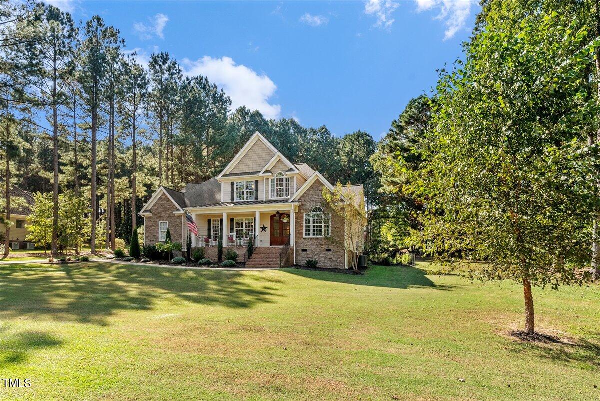 105 Jackson Road Youngsville, NC 27596 - Photo 3 of 55 a front view of a house with a yard