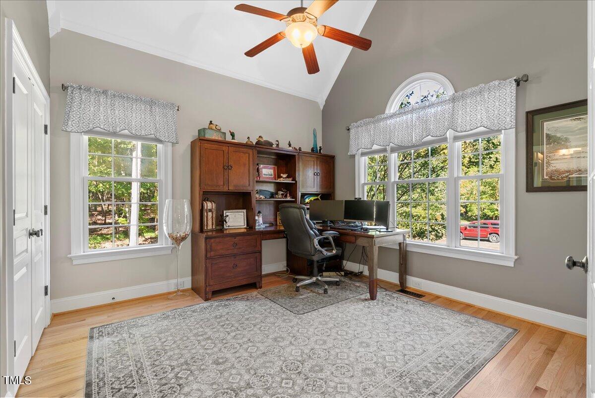 105 Jackson Road Youngsville, NC 27596 - Photo 31 of 55 a view of a workspace with furniture and a window