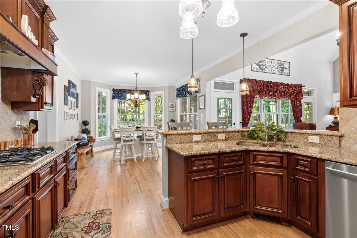 105 Jackson Road Youngsville, NC 27596 - Photo 7 of 55 a kitchen with lots of counter top space and dining table