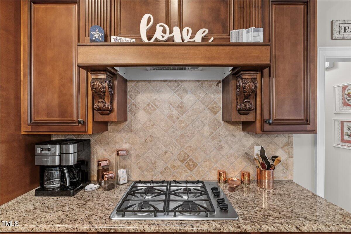 105 Jackson Road Youngsville, NC 27596 - Photo 9 of 55 a kitchen with a stove and a sink